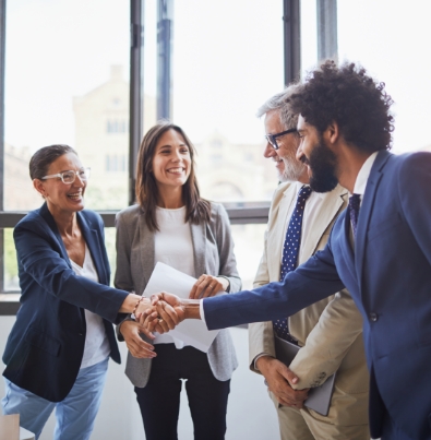 Buisness assosciates shaking hands